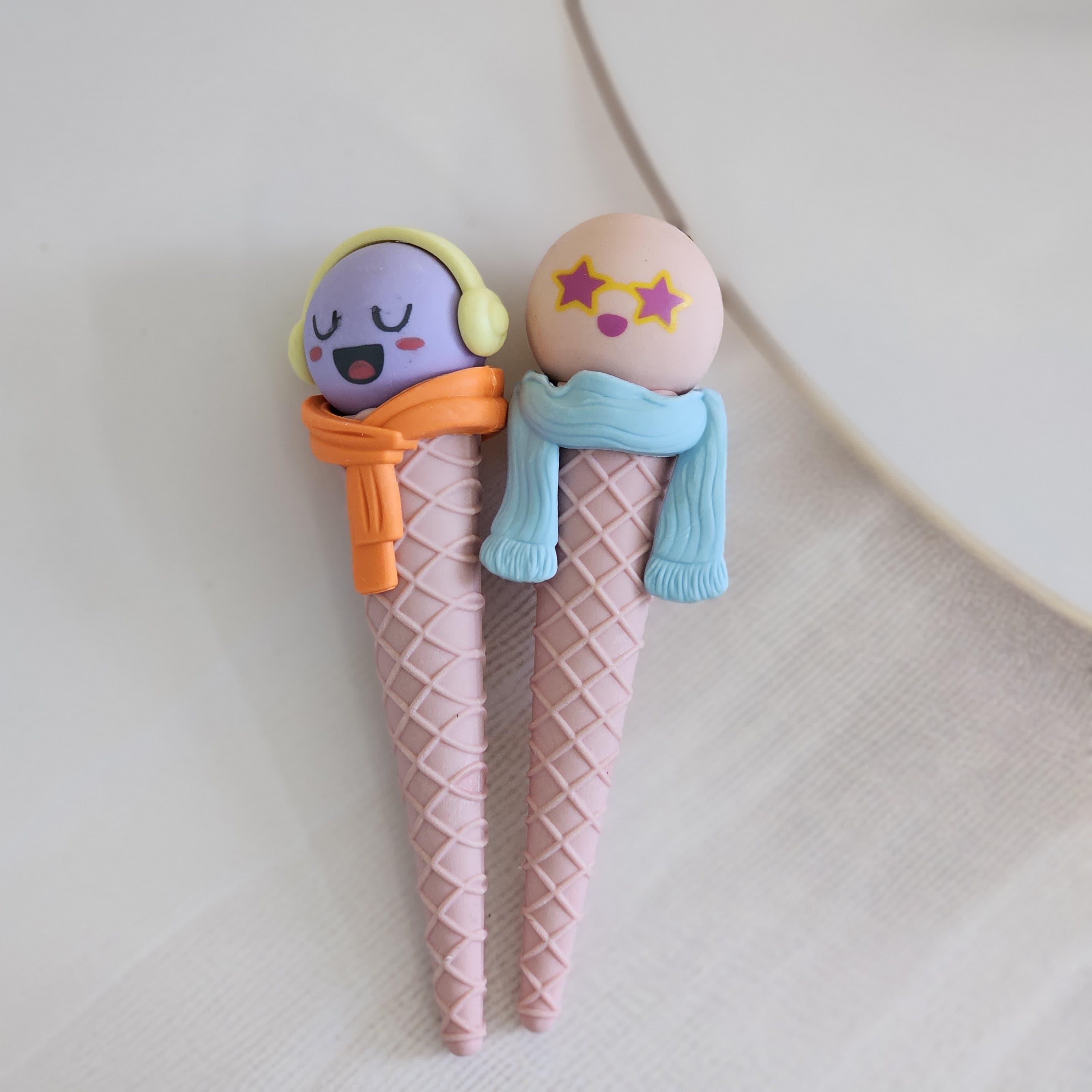 Novelty erasers shaped like ice cream cones with cartoon faces, fun and functional for kids, www.usmile.toys.